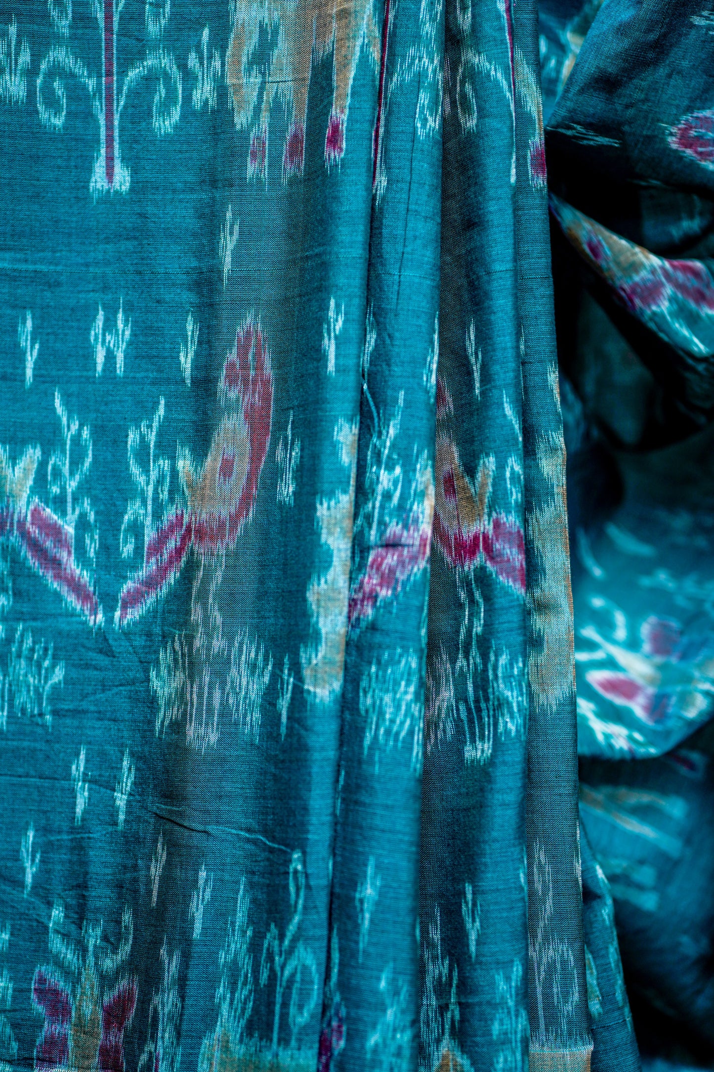 Sambalpuri Cotton( Deep Teal Green Base with Multi-Coloured Ikat Motifs)