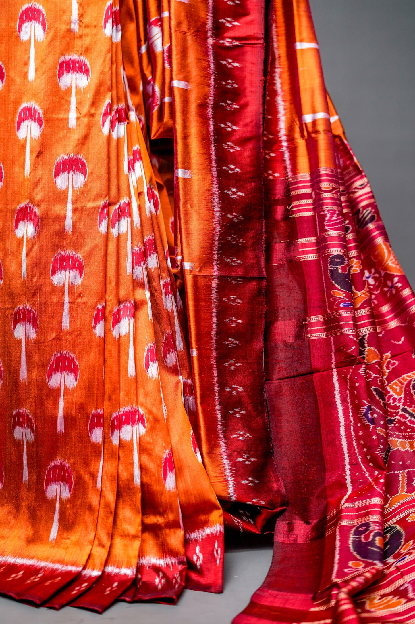 Khandua Silk (Deep maroon with intricate designs)