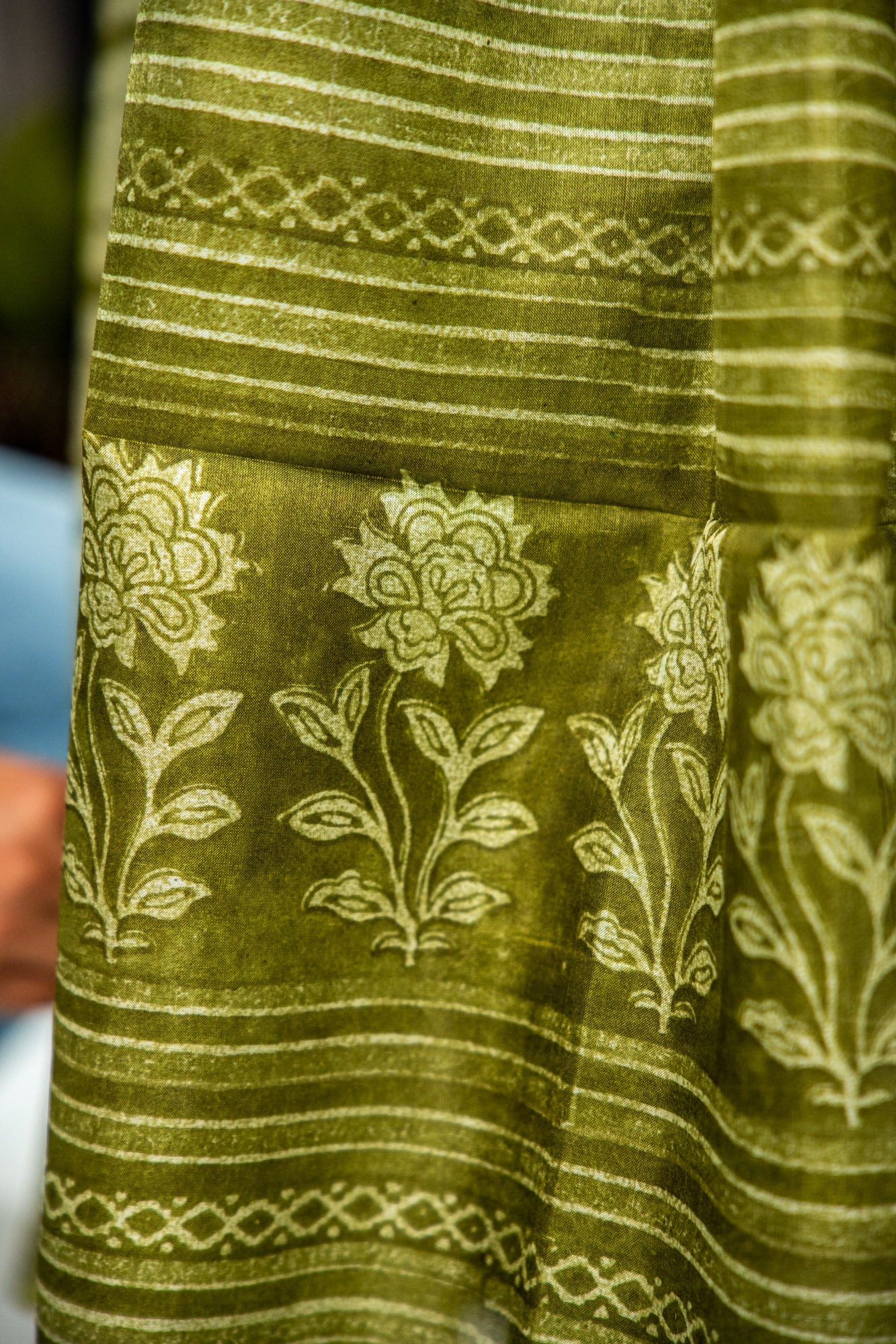 Olive Green / Muted Sage body with bright metallic/light gold highlights Pure Silk Saree