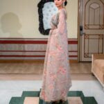 Hand dyed pure peach brown organza saree.