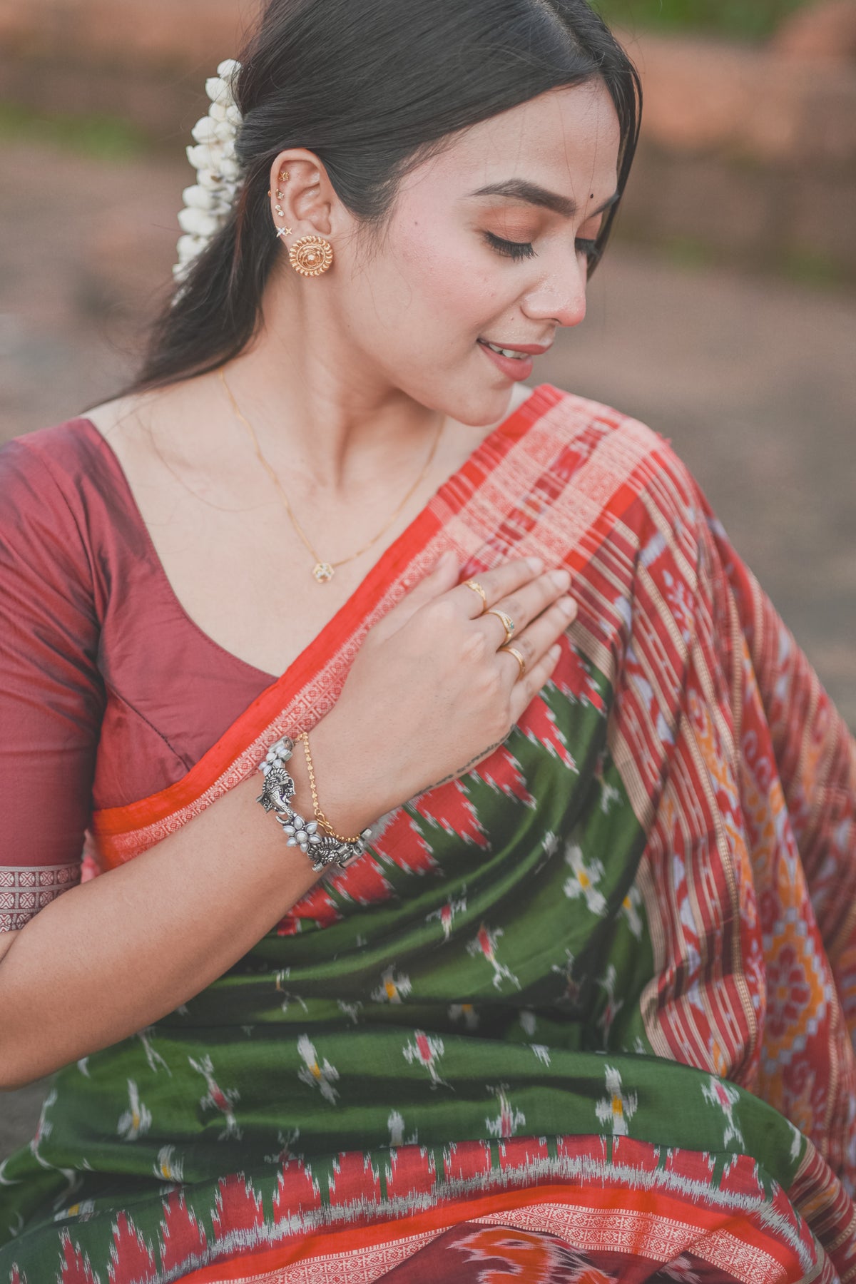 Olive Green Khandua Silk Saree with Ikat Buttis | Atulyakarigari