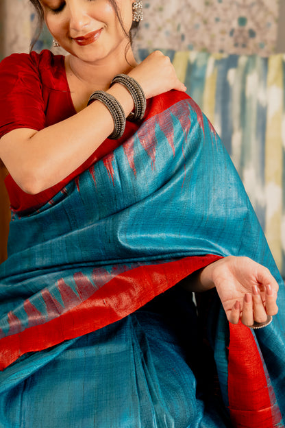 Peacock Blue Tussar Silk Saree with Red Border | Atulya Karigari