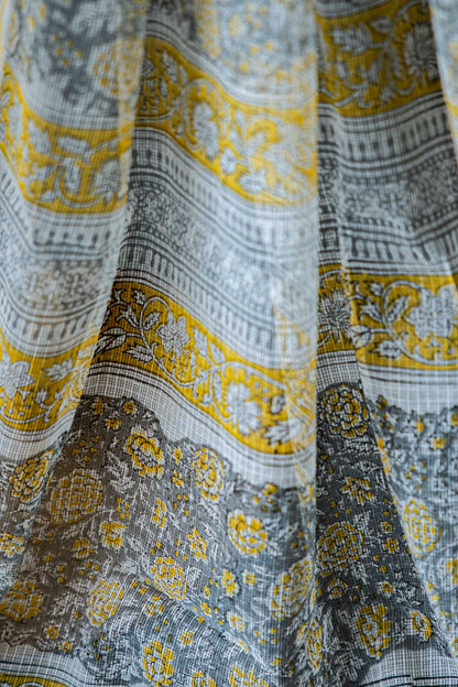 White Kota Doria Saree – Black & Yellow Floral Block Print