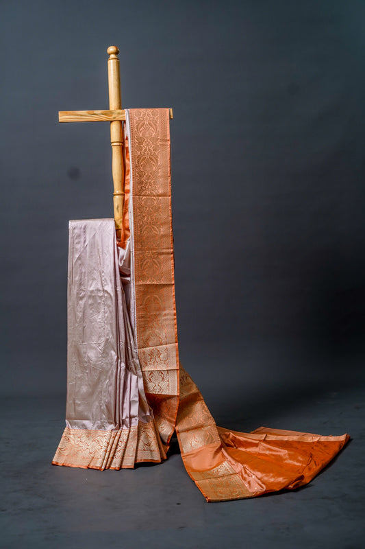 Katan Banarsi (soft pastel shades with rich golden-brown borders)