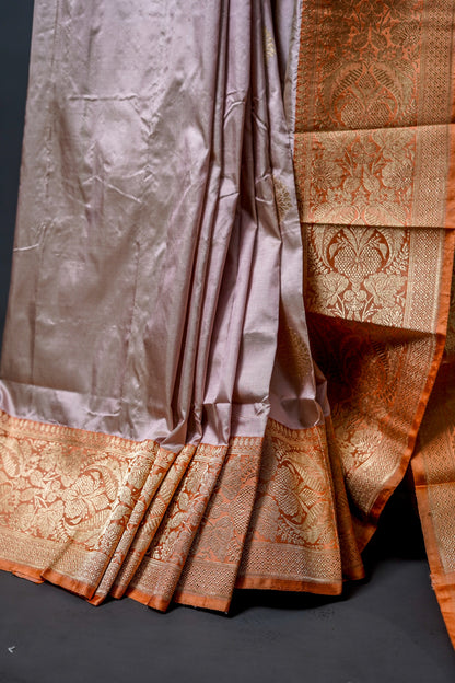 Katan Banarsi (soft pastel shades with rich golden-brown borders)