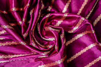 Pure Katan Banarsi (Rich purple with gold zari motifs)