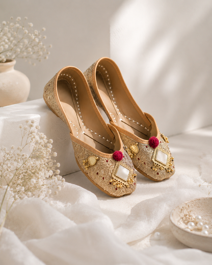 Handcrafted beige jutti with gold embroidery