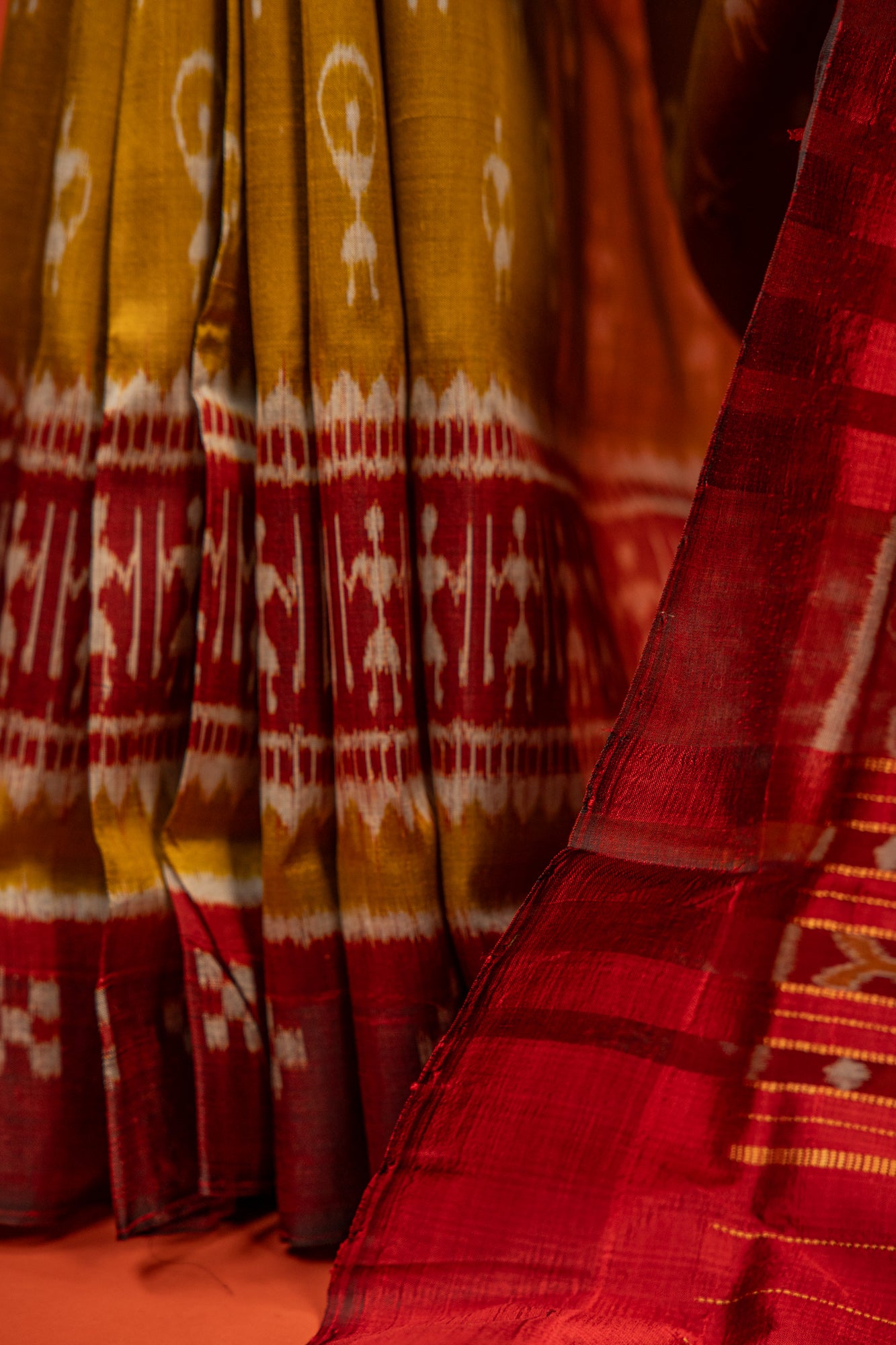 Olive Green Khandua Silk Saree with Tribal Doll & Kumbha Motifs | Odisha Handloom