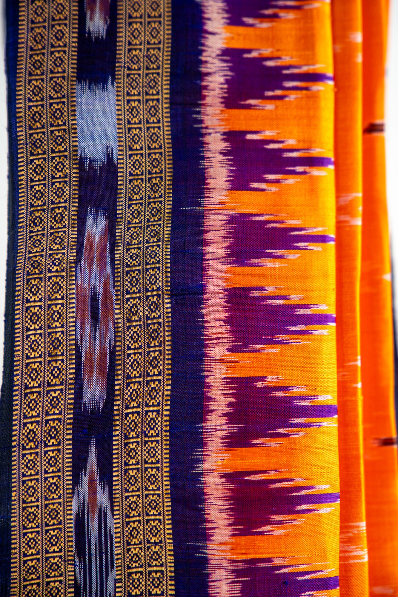 Marigold Orange and Royal Purple Khandua Silk Saree