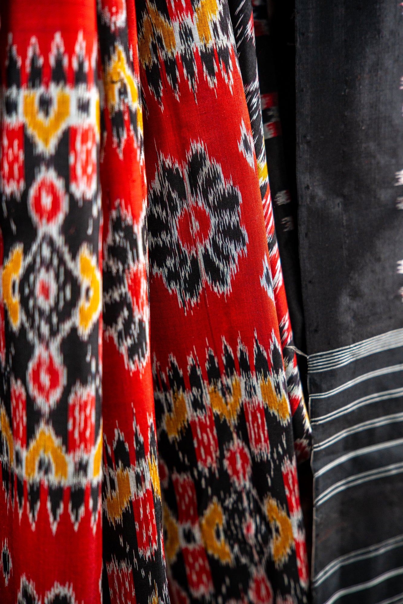 vibrant Brick Red / Coral Red , Charcoal Black Khandua Silk Saree