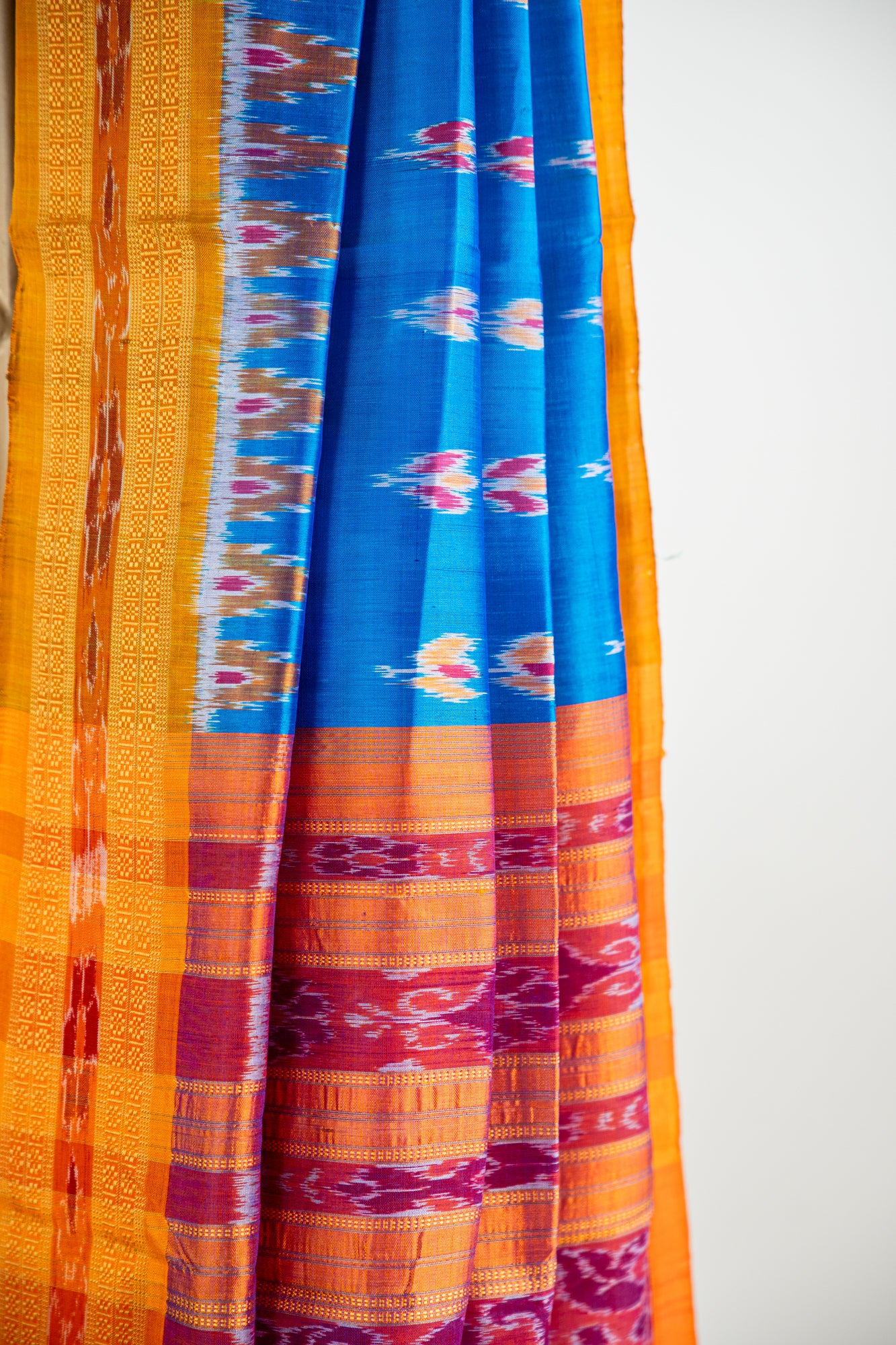 Luminous Blue,Mustard yellow/Bright Orange Khandua Silk Saree