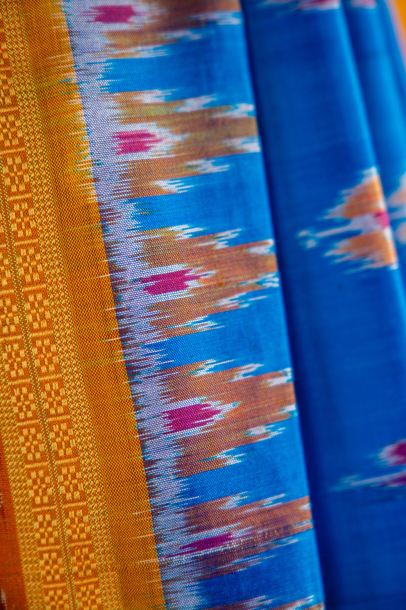 Luminous Blue,Mustard yellow/Bright Orange Khandua Silk Saree