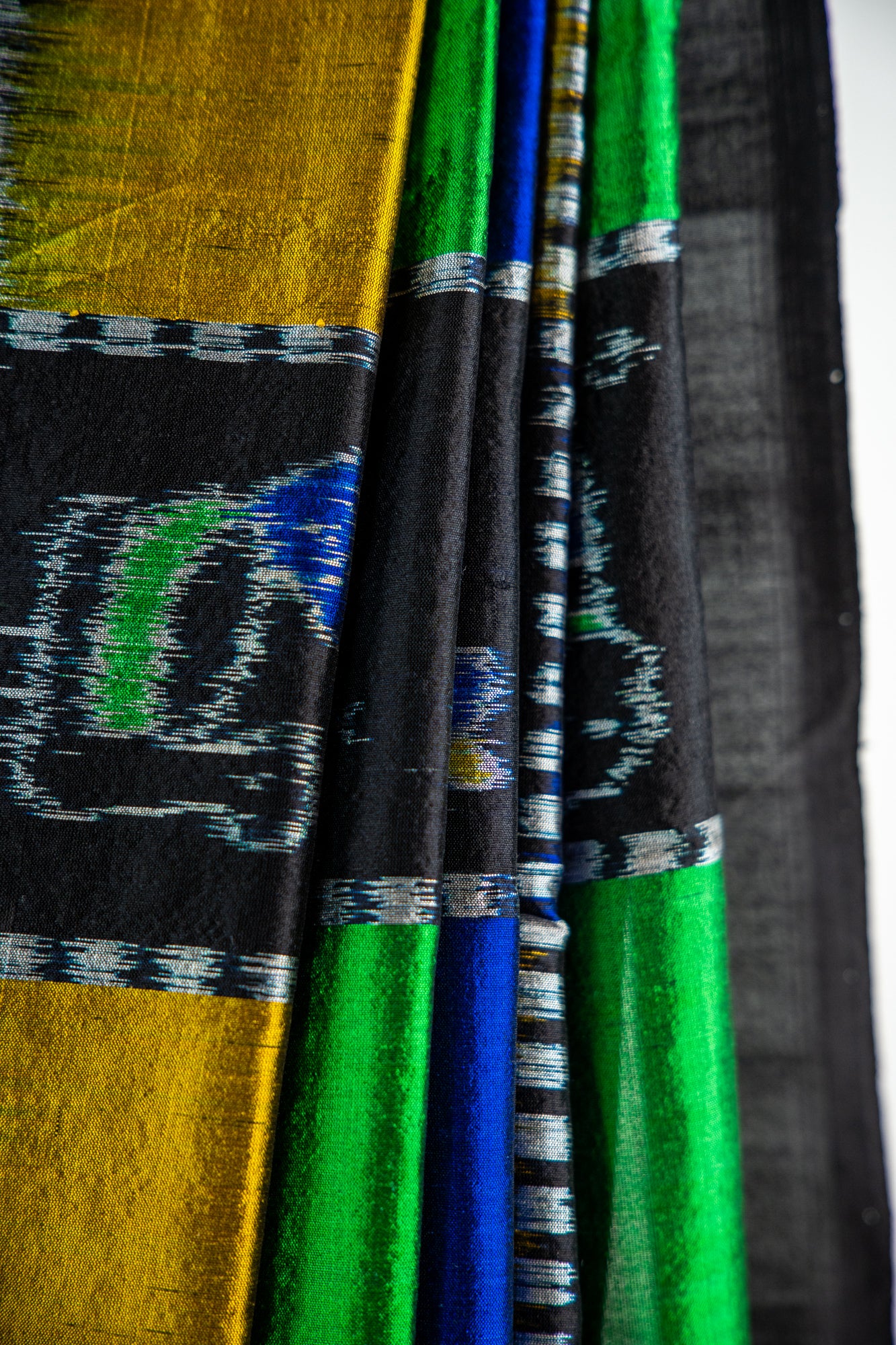 Cobalt Blue, Kelly Green, and Ochre Yellow , Jet Black Khandua Silk Saree