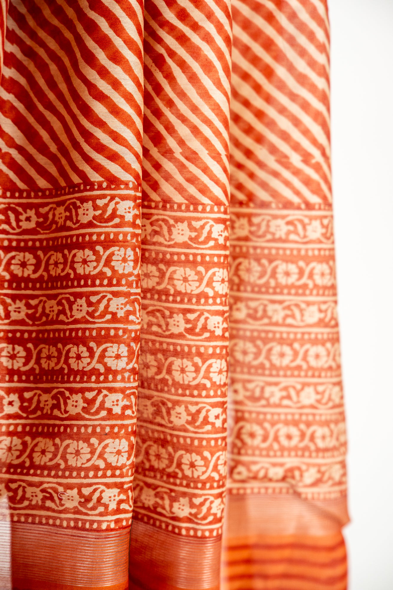 Deep Charcoal Black base with an intricate Silver-Grey and Off-White overlay Chanderi Silk Saree