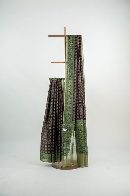 Dark Terracotta / Burnt Sienna Red body with a contrasting solid Black border Pure Silk Saree