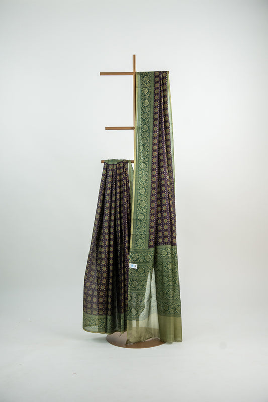 Dark Terracotta / Burnt Sienna Red body with a contrasting solid Black border Pure Silk Saree