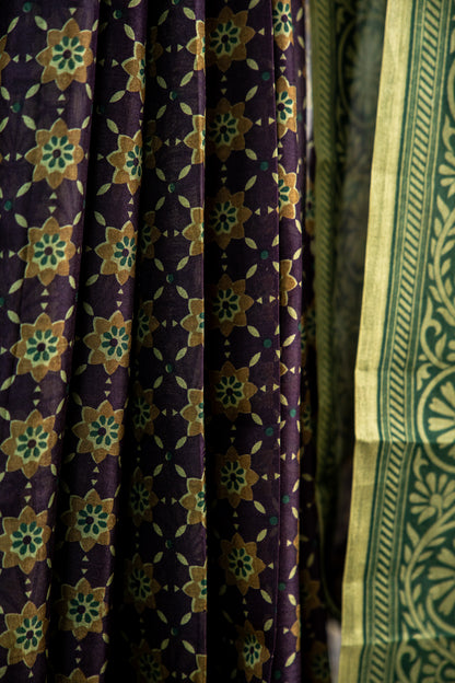 Dark Terracotta / Burnt Sienna Red body with a contrasting solid Black border Pure Silk Saree