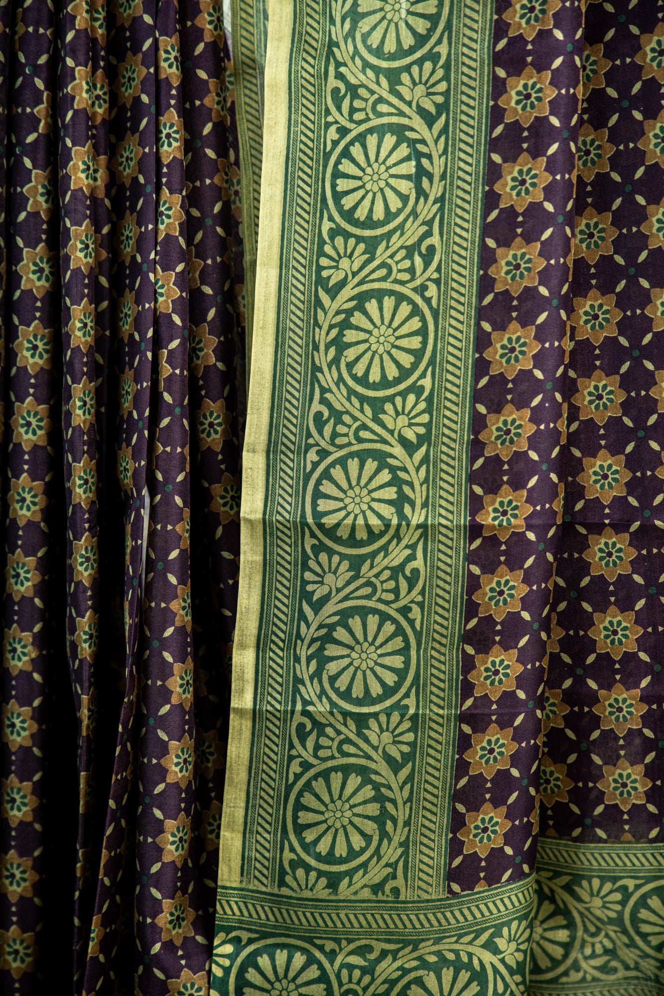 Dark Terracotta / Burnt Sienna Red body with a contrasting solid Black border Pure Silk Saree
