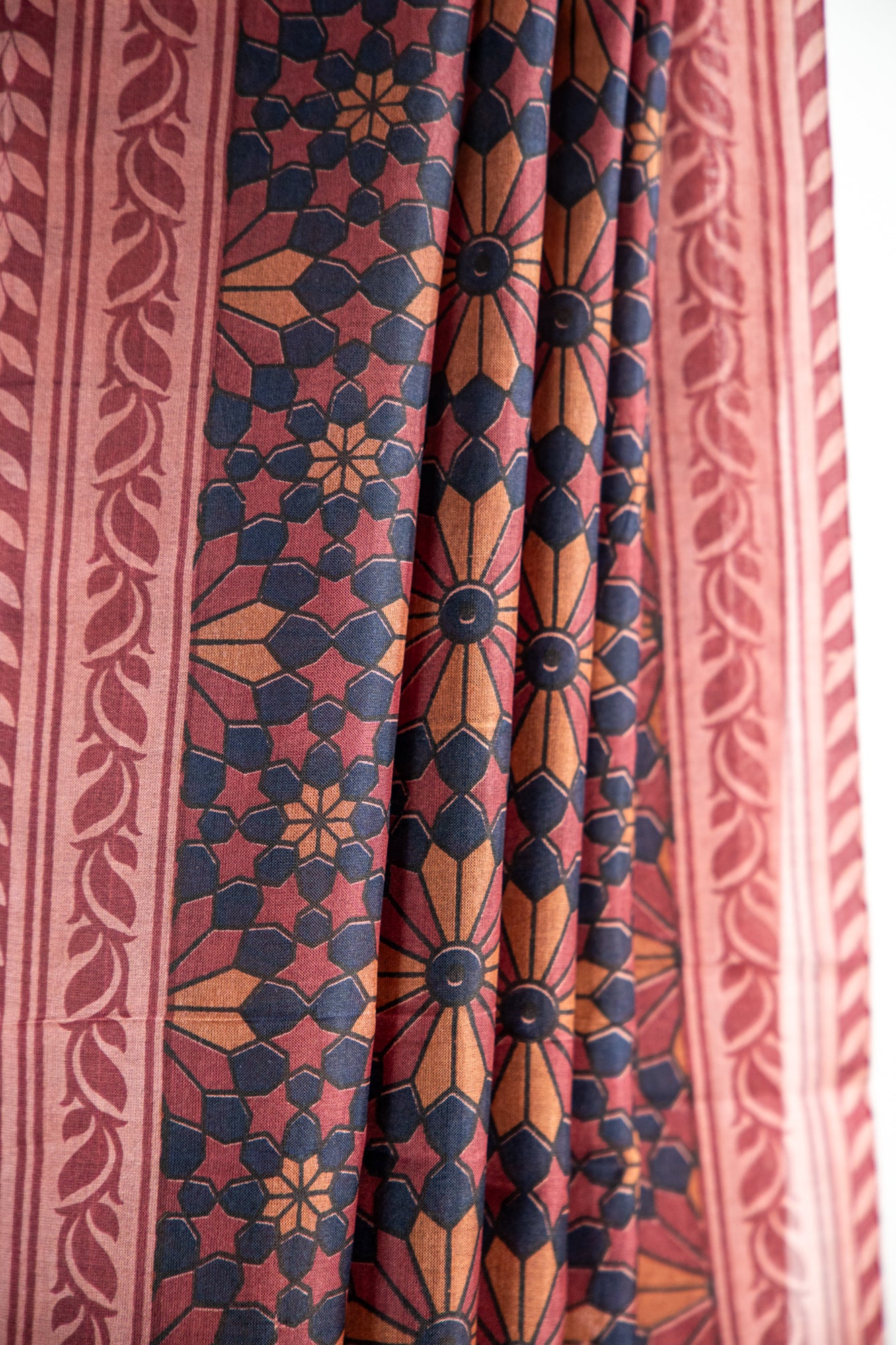 Rich Chocolate Brown / Dark Cocoa base accented with warm Beige and Cream motifs Pure Silk Saree