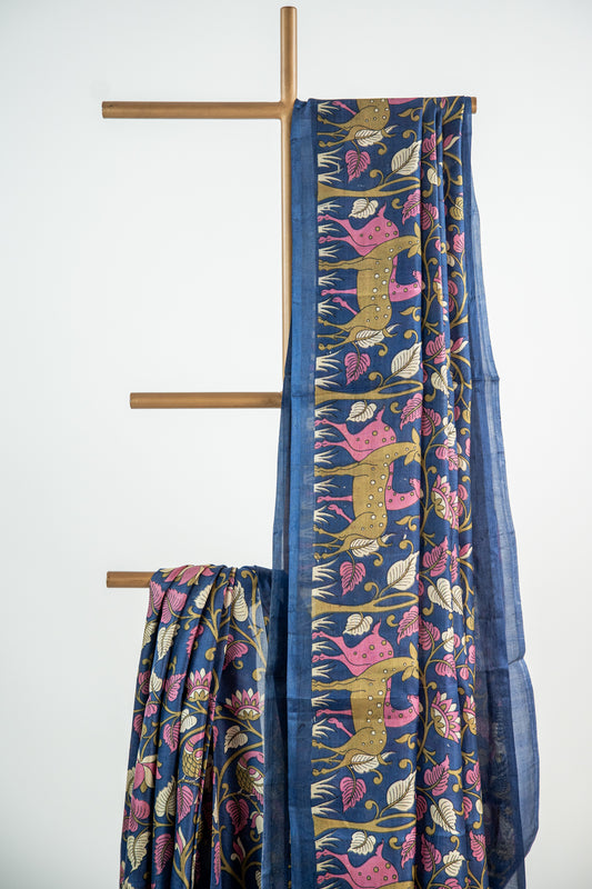 Royal Midnight Blue base adorned with Sage Green, Cream, and soft Coral Pink Pure Silk Saree