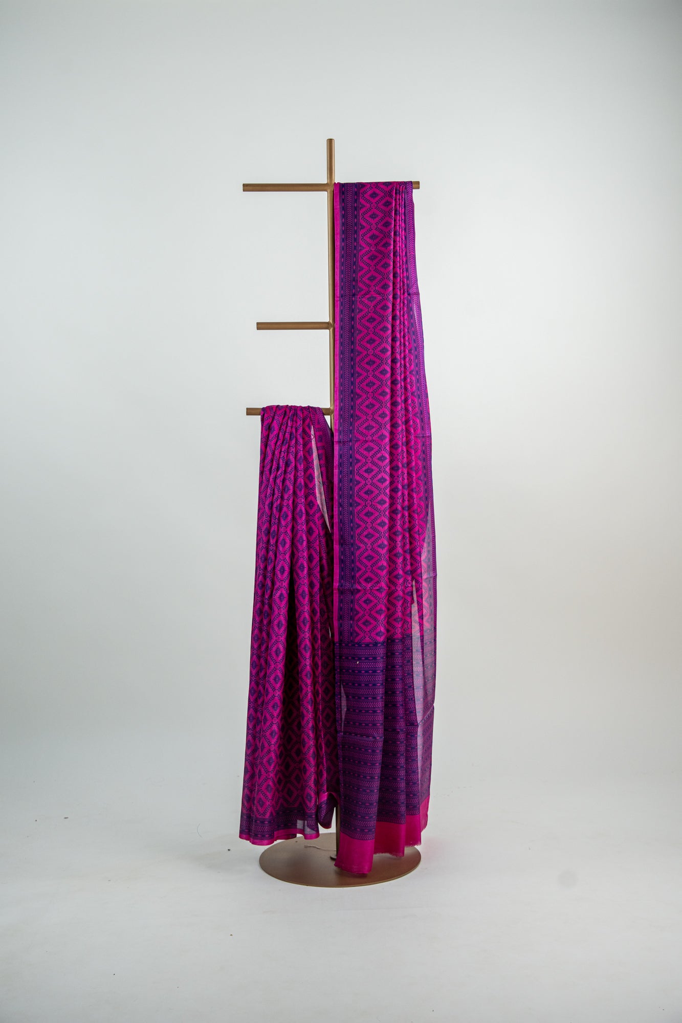 Vibrant Fuchsia Pink body with a deep Indigo Blue contrast print and border Pure Silk Saree
