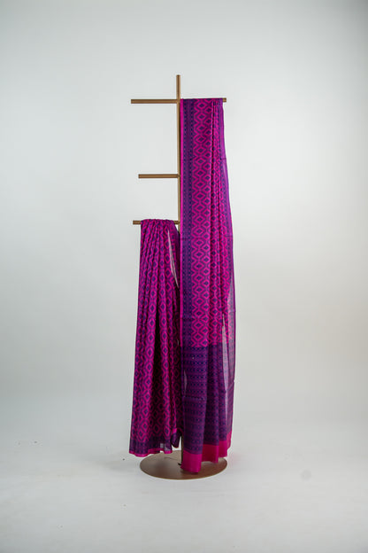 Vibrant Fuchsia Pink body with a deep Indigo Blue contrast print and border Pure Silk Saree