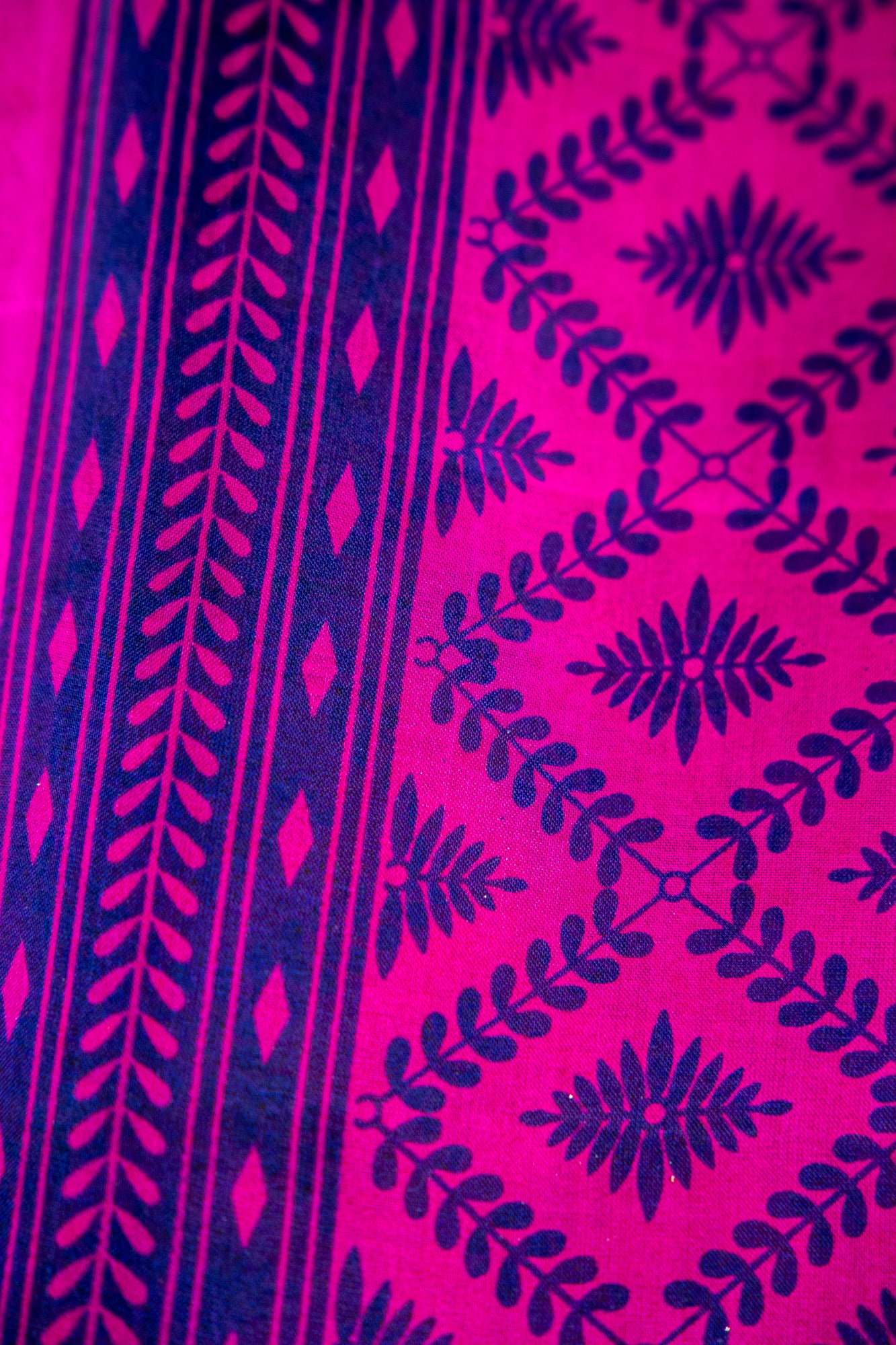 Vibrant Fuchsia Pink body with a deep Indigo Blue contrast print and border Pure Silk Saree