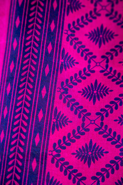 Vibrant Fuchsia Pink body with a deep Indigo Blue contrast print and border Pure Silk Saree