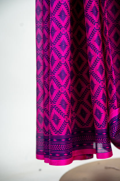 Vibrant Fuchsia Pink body with a deep Indigo Blue contrast print and border Pure Silk Saree