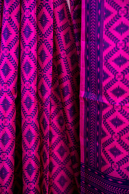 Vibrant Fuchsia Pink body with a deep Indigo Blue contrast print and border Pure Silk Saree