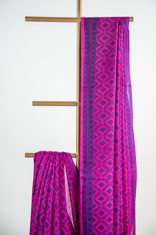 Vibrant Fuchsia Pink body with a deep Indigo Blue contrast print and border Pure Silk Saree