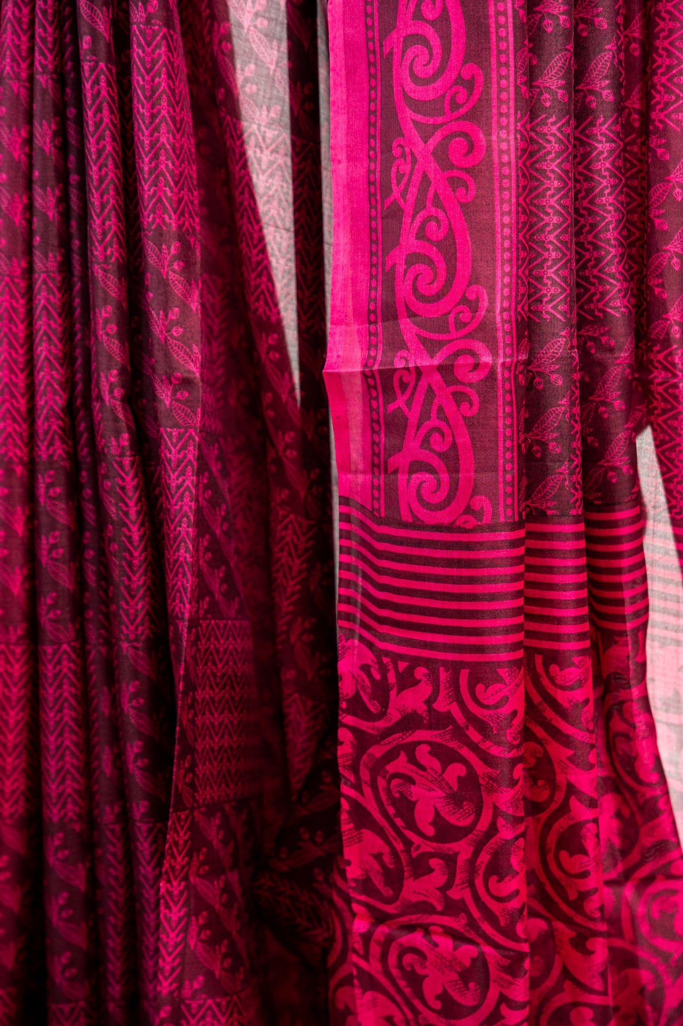 Rich Burgundy / Dark Wine base with a bright Magenta Pink contrast print Pure Silk Saree