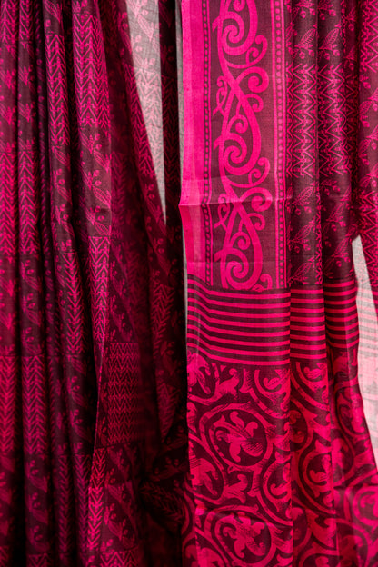 Rich Burgundy / Dark Wine base with a bright Magenta Pink contrast print Pure Silk Saree