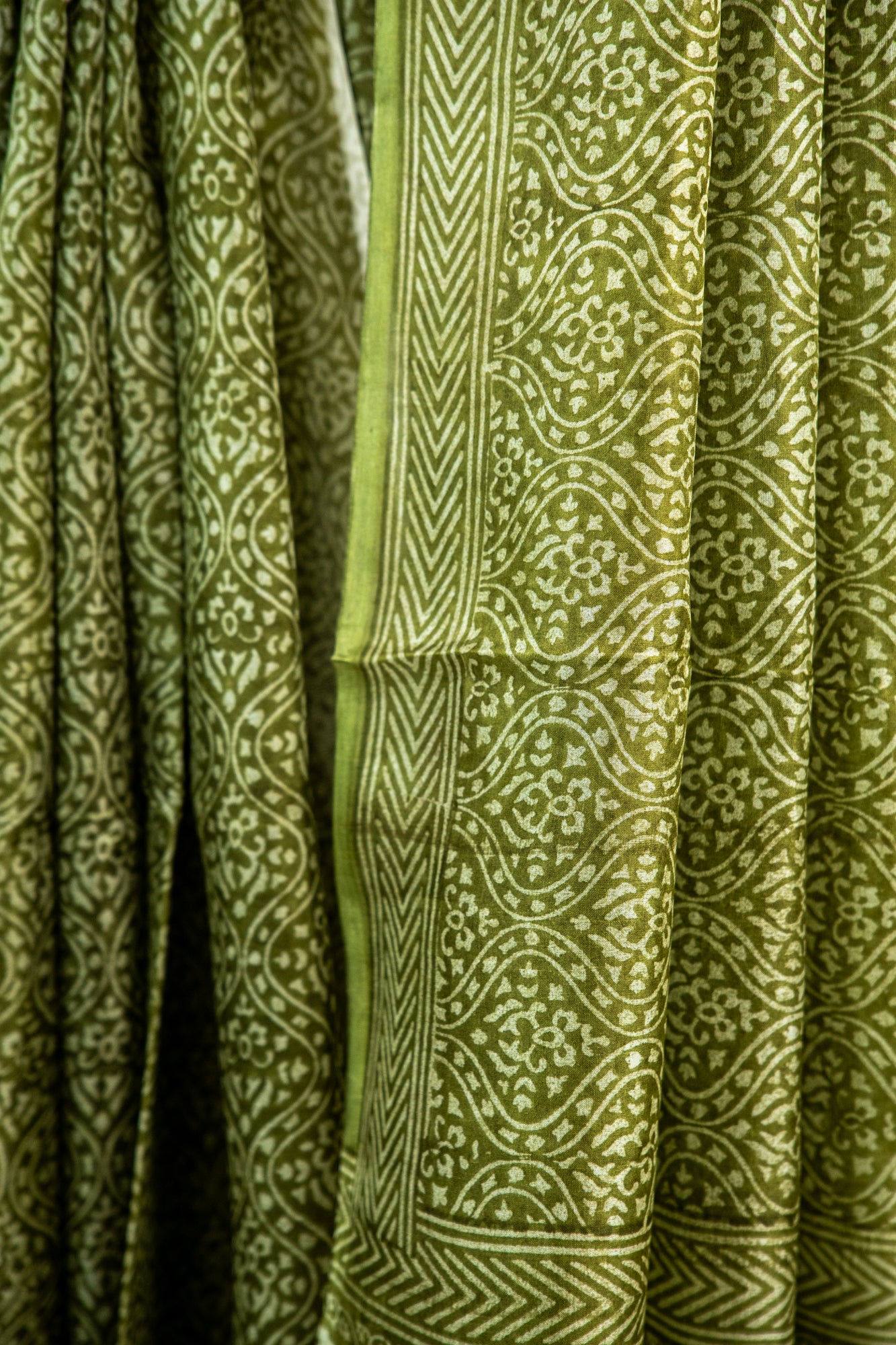 Mehendi Green / Rich Moss Green base with a soft cream contour Pure Silk Saree
