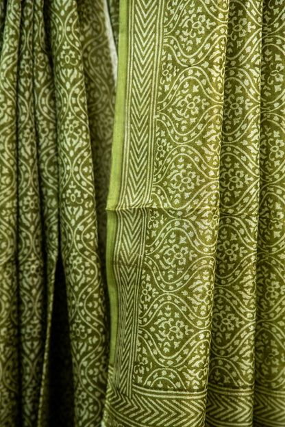 Mehendi Green / Rich Moss Green base with a soft cream contour Pure Silk Saree