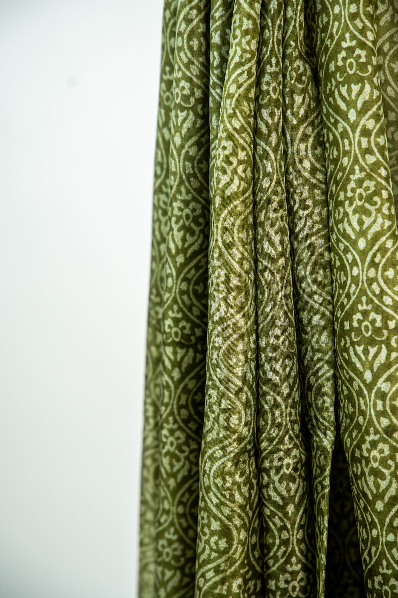 Mehendi Green / Rich Moss Green base with a soft cream contour Pure Silk Saree