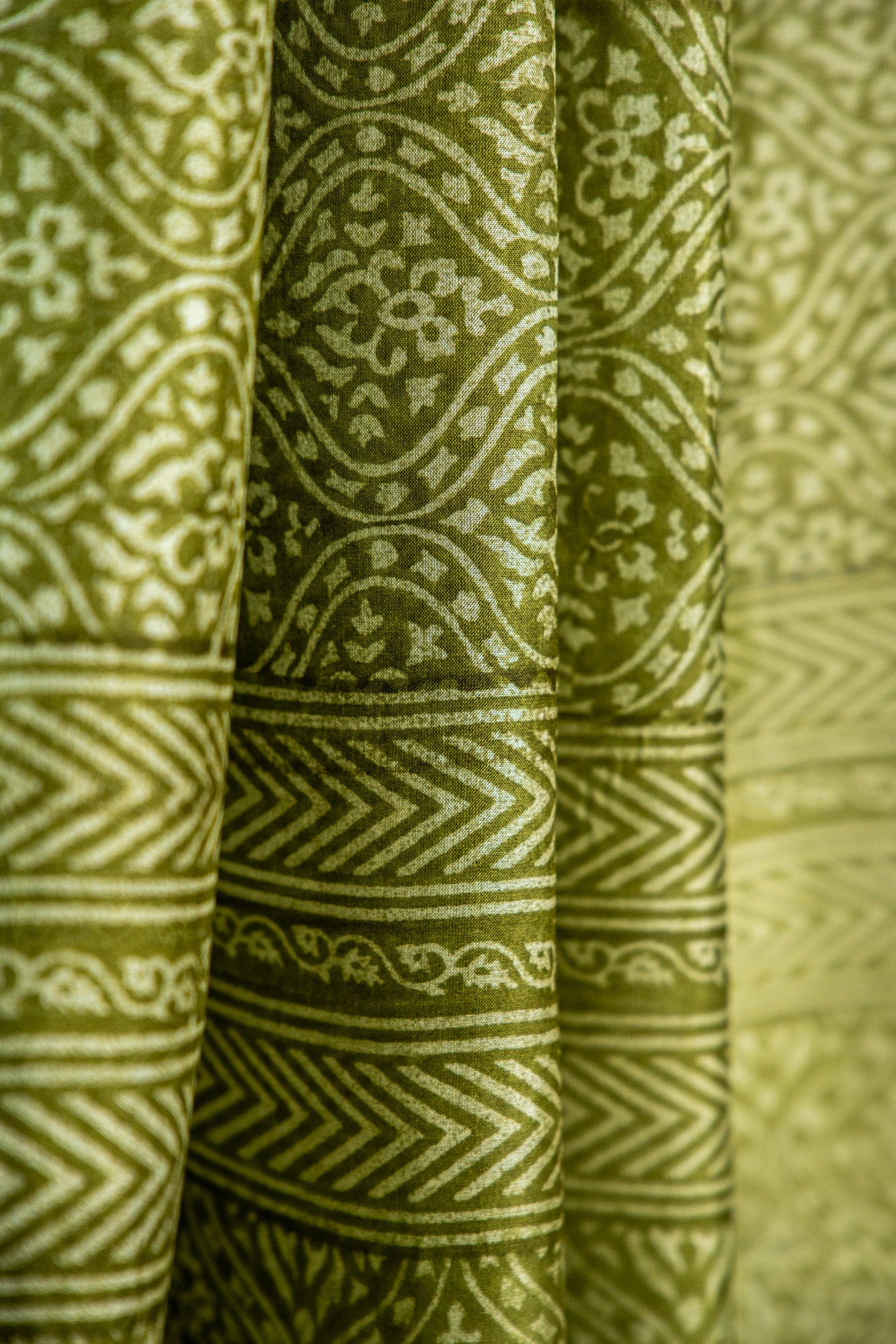Mehendi Green / Rich Moss Green base with a soft cream contour Pure Silk Saree