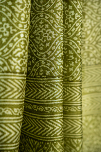 Mehendi Green / Rich Moss Green base with a soft cream contour Pure Silk Saree