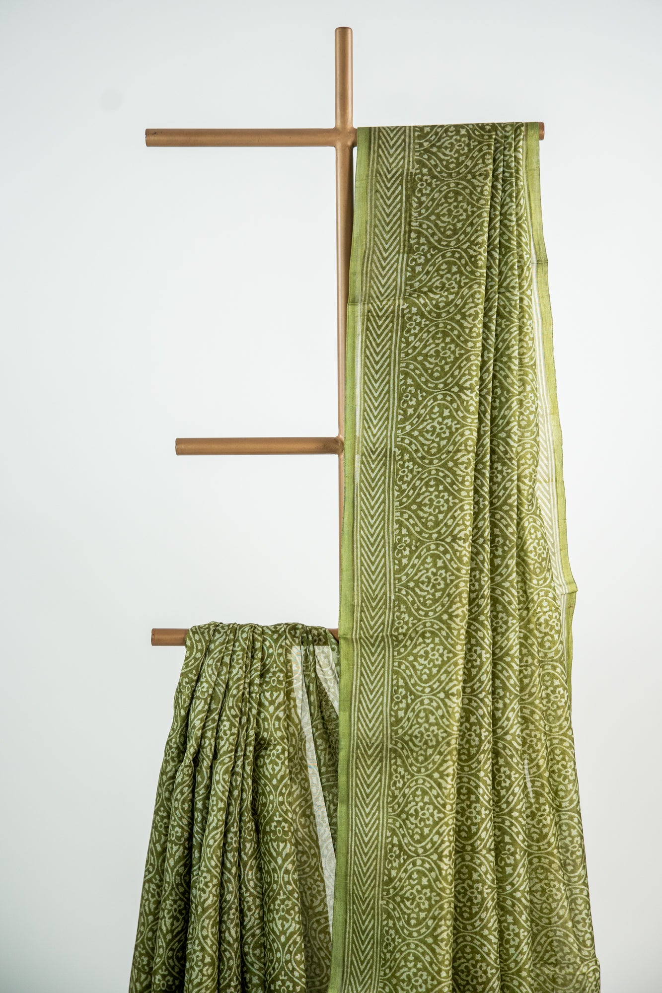 Mehendi Green / Rich Moss Green base with a soft cream contour Pure Silk Saree