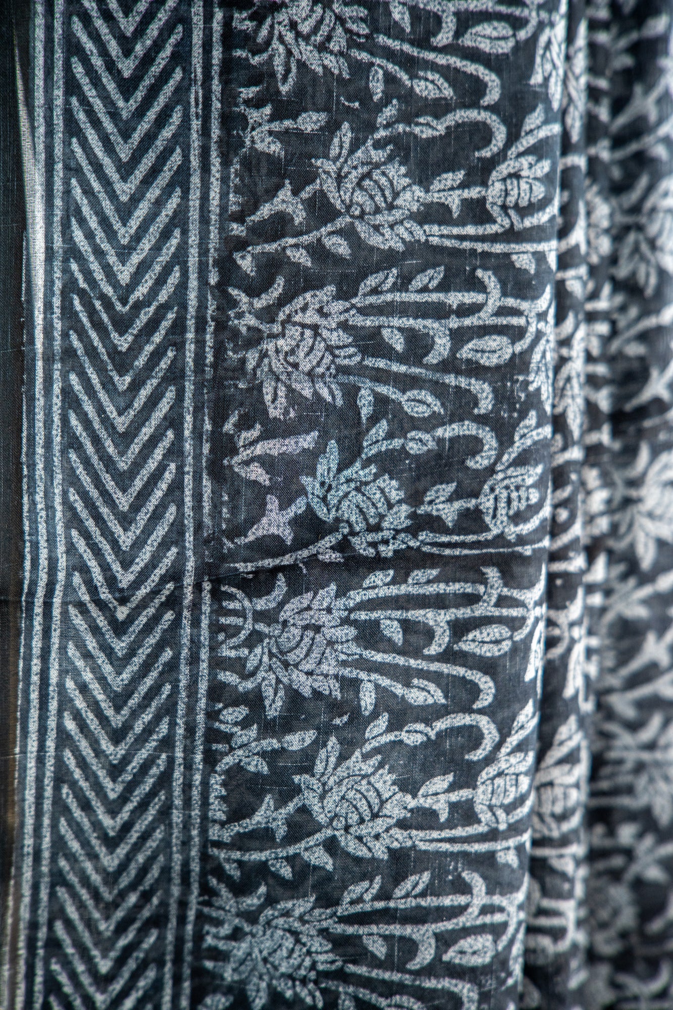 Jet Black base with an intricate, dense Silver-Grey print Pure Silk Saree