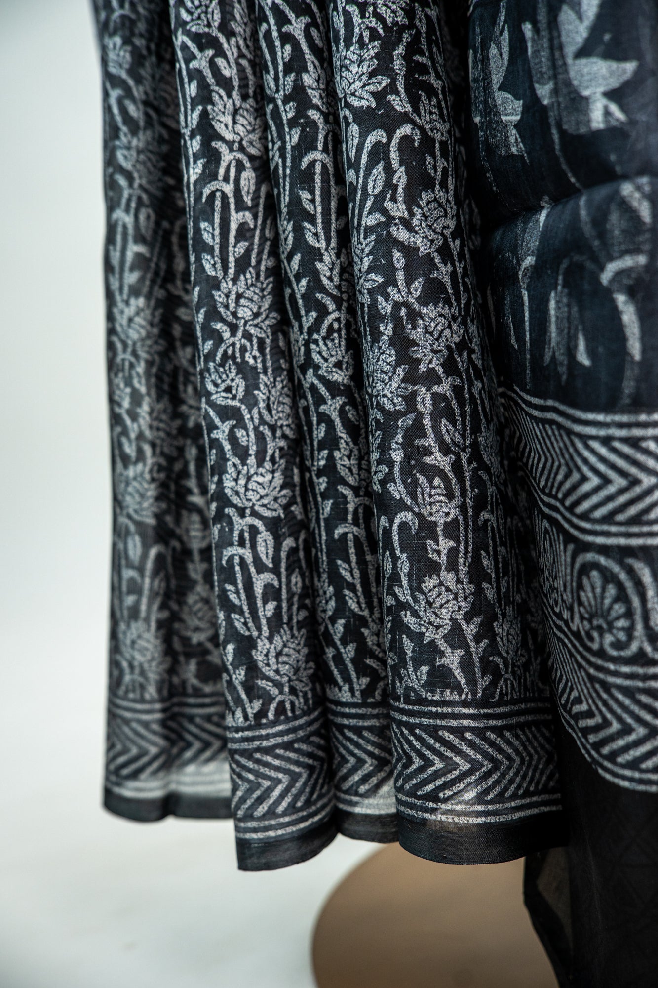 Jet Black base with an intricate, dense Silver-Grey print Pure Silk Saree