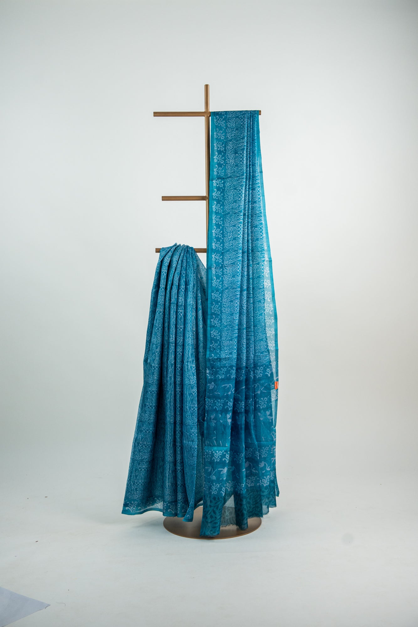 Deep Teal Blue / Prussian Blue base with a frosty Silver-Grey overlay print Pure Silk Saree