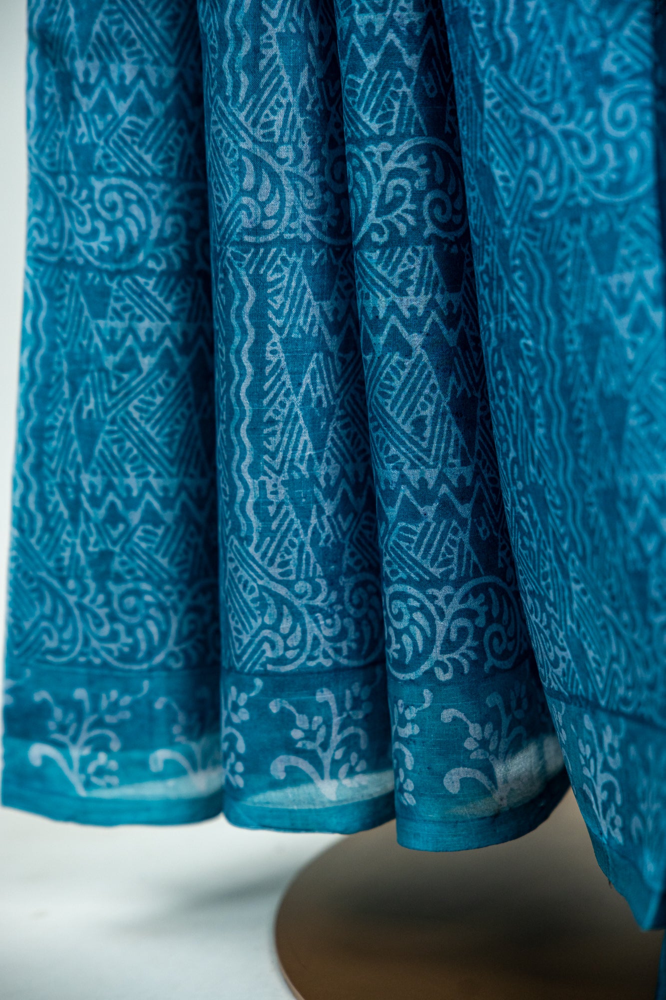 Deep Teal Blue / Prussian Blue base with a frosty Silver-Grey overlay print Pure Silk Saree