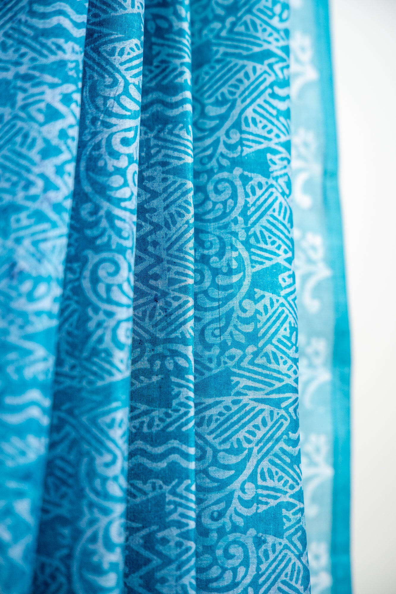 Deep Teal Blue / Prussian Blue base with a frosty Silver-Grey overlay print Pure Silk Saree