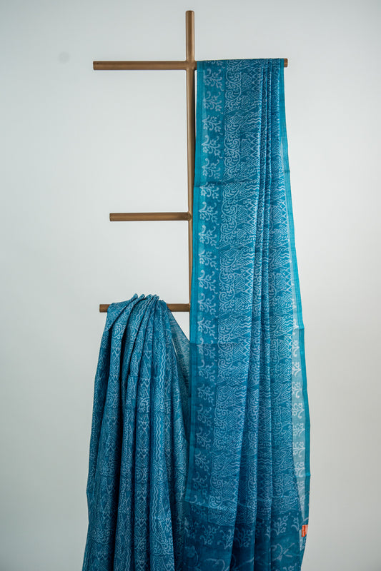 Deep Teal Blue / Prussian Blue base with a frosty Silver-Grey overlay print Pure Silk Saree