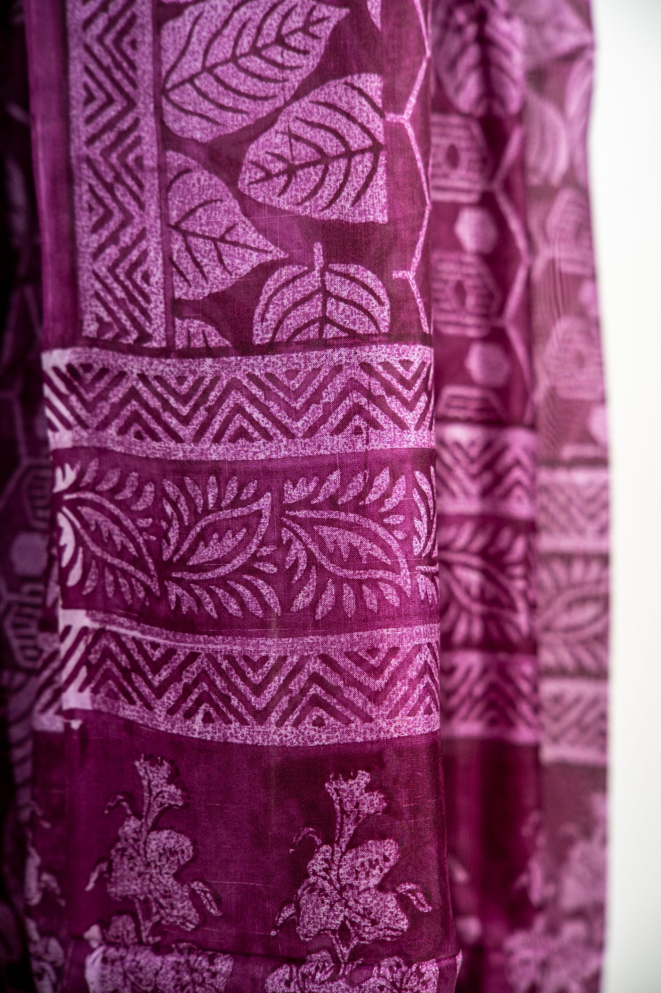 Deep Plum / Rich Wine tone with a lighter lilac-pink overlay Pure Silk Saree