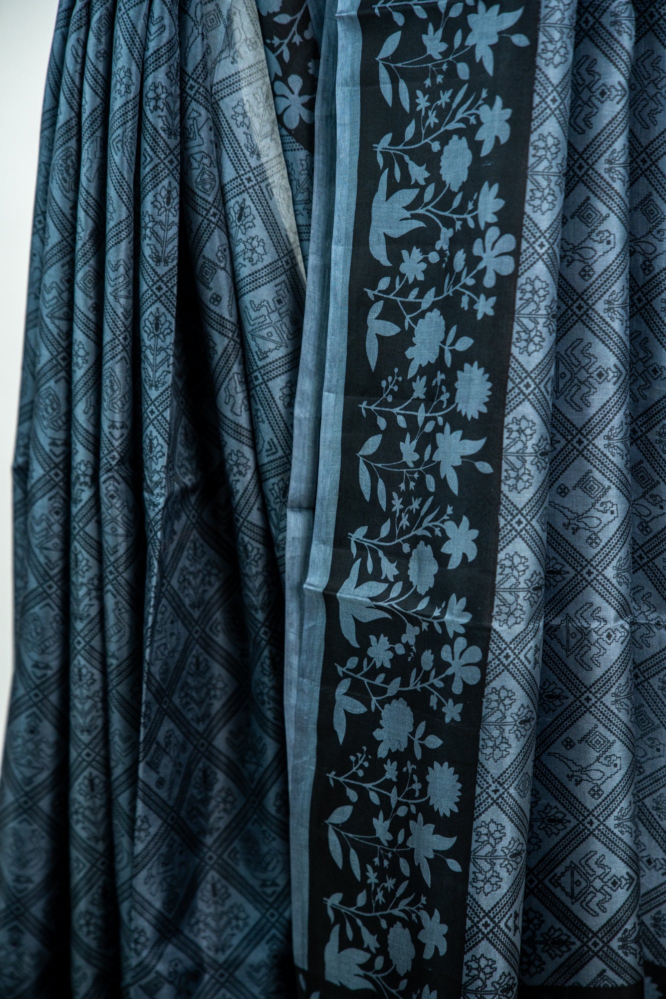 Slate Grey / Steel Blue body with a Charcoal Black contrast Pure Silk Saree