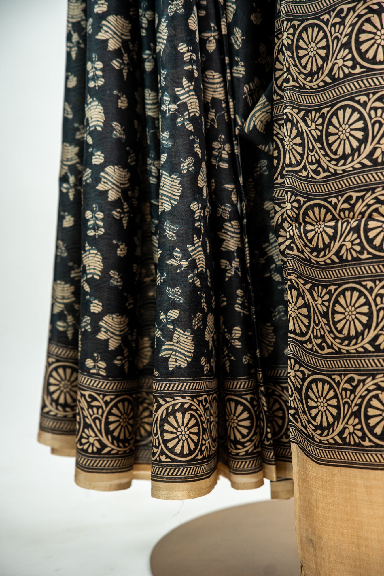Charcoal Black base with a warm Ivory/Beige print Pure Silk Saree