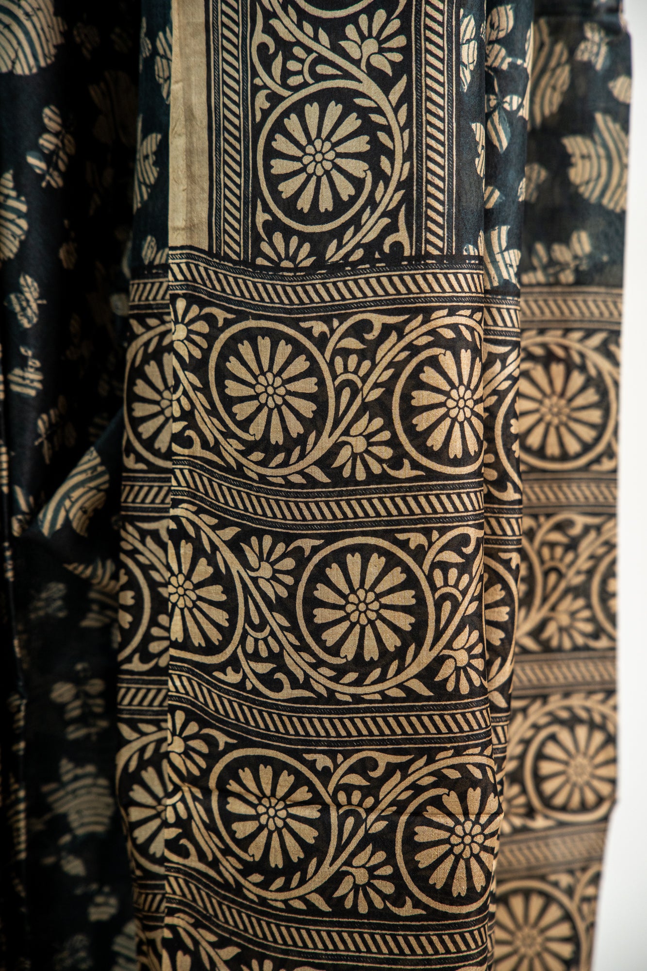 Charcoal Black base with a warm Ivory/Beige print Pure Silk Saree
