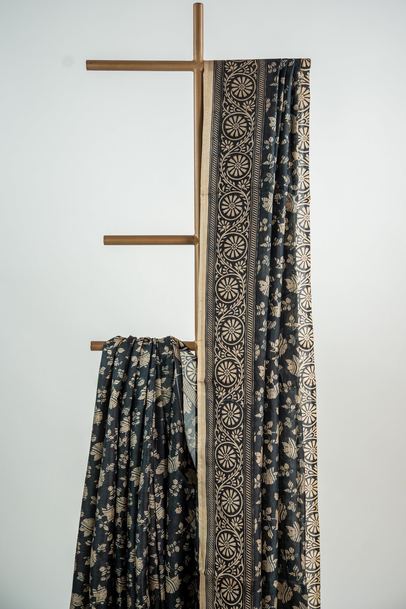 Charcoal Black base with a warm Ivory/Beige print Pure Silk Saree